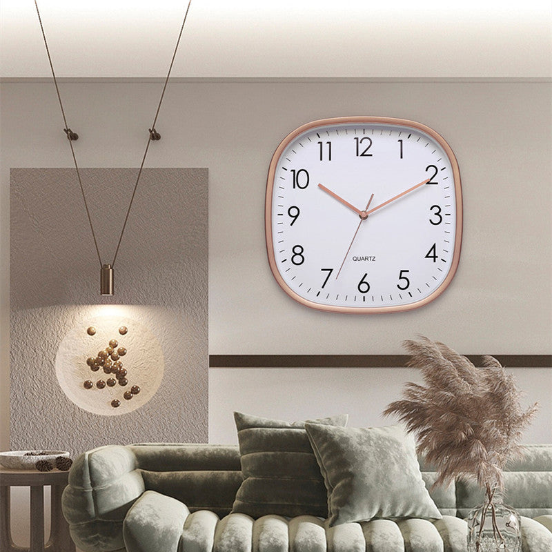 Close-up of the rose gold wall clock dial