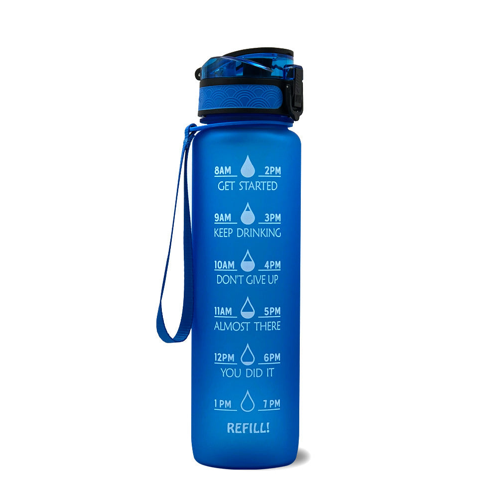Flip-top lid with carry loop on the water bottle