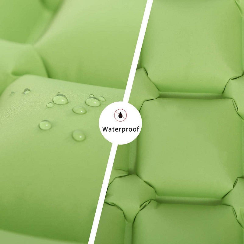 Inflatable camping sleeping mat rolled up in its carry bag