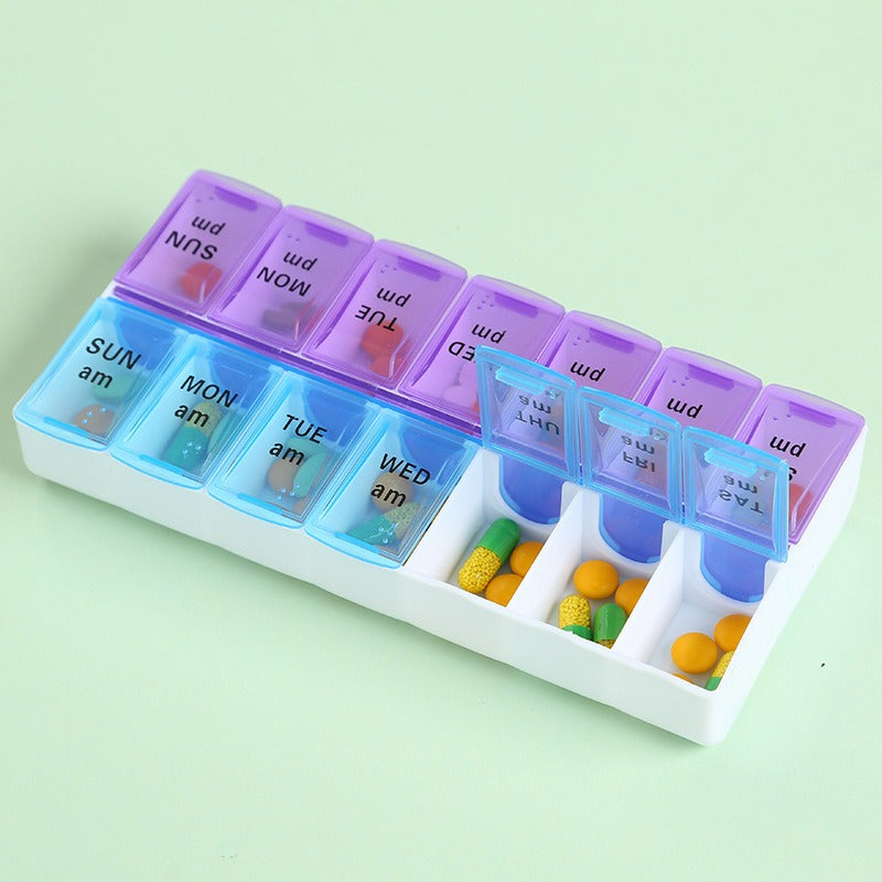 Pill organiser day labels close-up