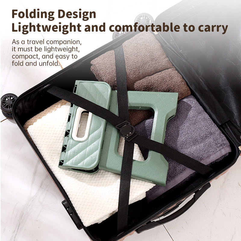 Folding stool held in hand