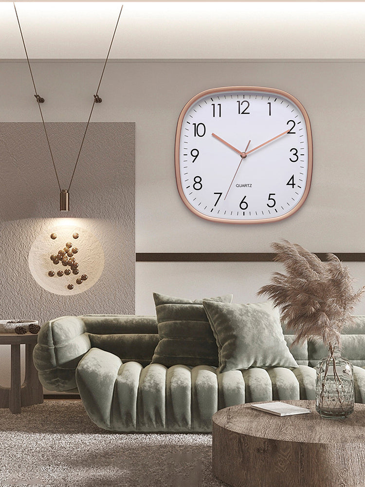 Luminous wall clock shown by day and night