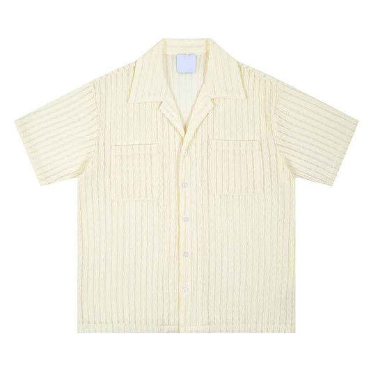 A loose and casual short-sleeved shirt with a design sense of wheat ear and milk apricot color, featuring a hollowed-out design