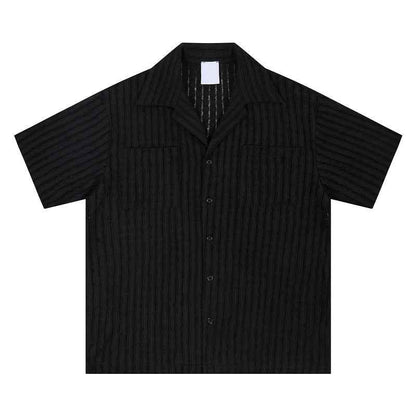 A loose and casual short-sleeved shirt with a design sense of wheat ear and milk apricot color, featuring a hollowed-out design