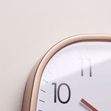 Silent wall clock hung in a living room