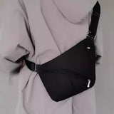 Crossbody bag worn on the right shoulder