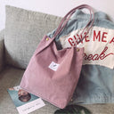 Corduroy tote bag carried on the shoulder