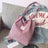 Corduroy tote bag carried on the shoulder