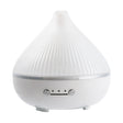 Essential oil diffuser on a bedside table