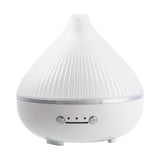 Essential oil diffuser on a bedside table