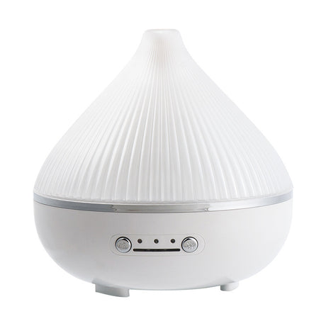 Essential oil diffuser on a bedside table