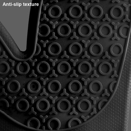 Oven glove holding a hot baking tray