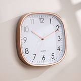 Wall clock hands glowing in the dark