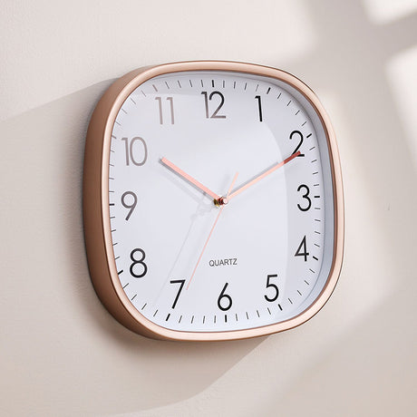 Wall clock hands glowing in the dark