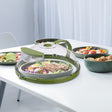 Microwave splatter cover with steam vent