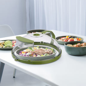 Microwave splatter cover with steam vent