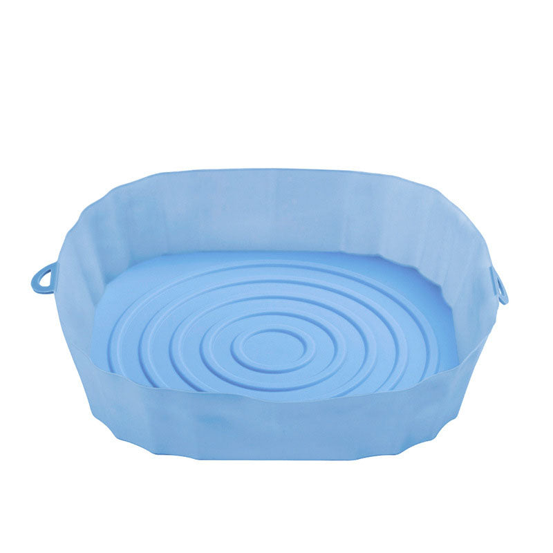 Silicone liner inside an air fryer basket