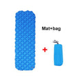 Inflatable camping sleeping mat in orange