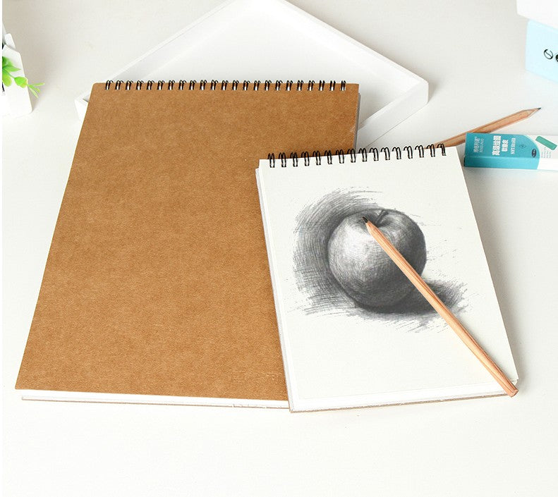 A4 sketchbook held in hand