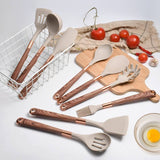Full range of silicone cooking utensils laid out