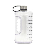 Person drinking from the 2.2L water bottle at the gym