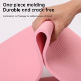 Yoga mat rolled up for carrying