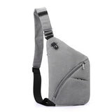 Crossbody bag compartments shown open