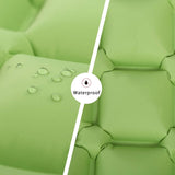 Inflatable camping sleeping mat rolled up in its carry bag