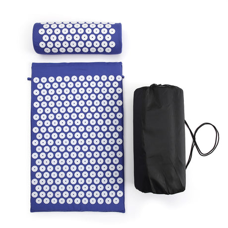Person relaxing on the acupressure mat