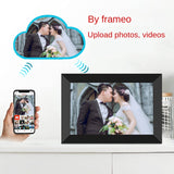 Digital photo frame on a living room sideboard