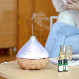 Diffuser glowing with colour-changing night light