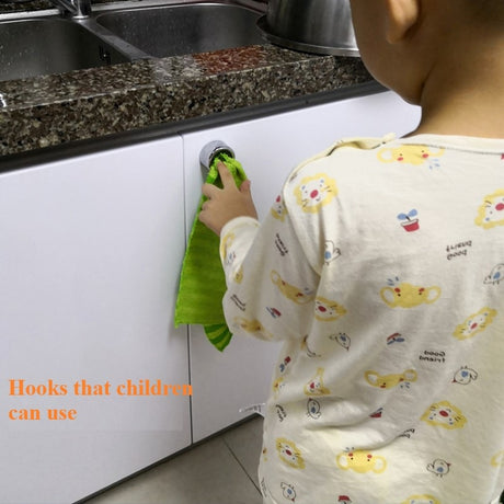 Adhesive hooks used behind a door