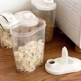 Press-to-pour lid on the cereal dispenser