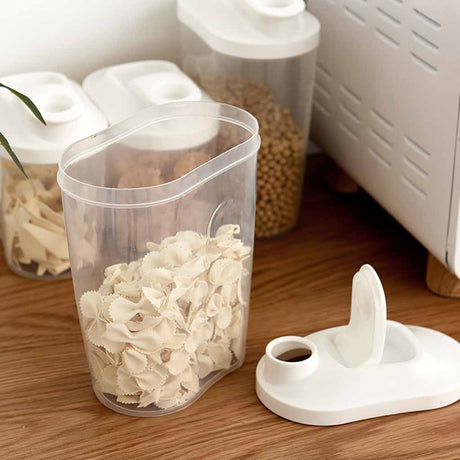Press-to-pour lid on the cereal dispenser