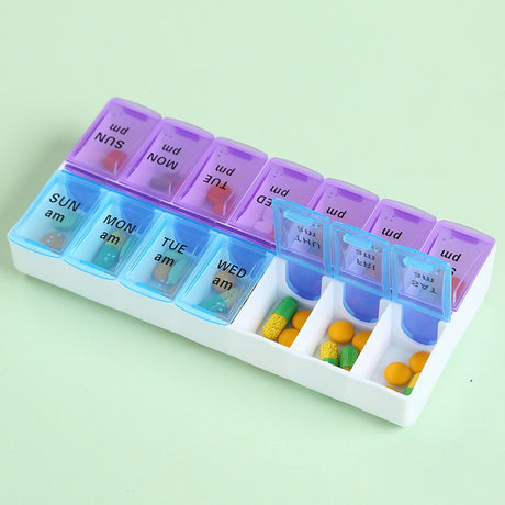 Pill organiser day labels close-up