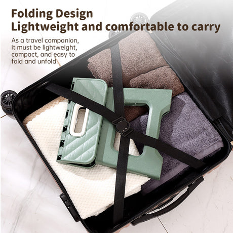 Folding stool held in hand