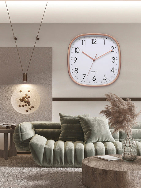 Luminous wall clock shown by day and night