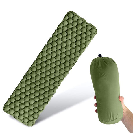Inflatable camping sleeping mat laid out on the ground