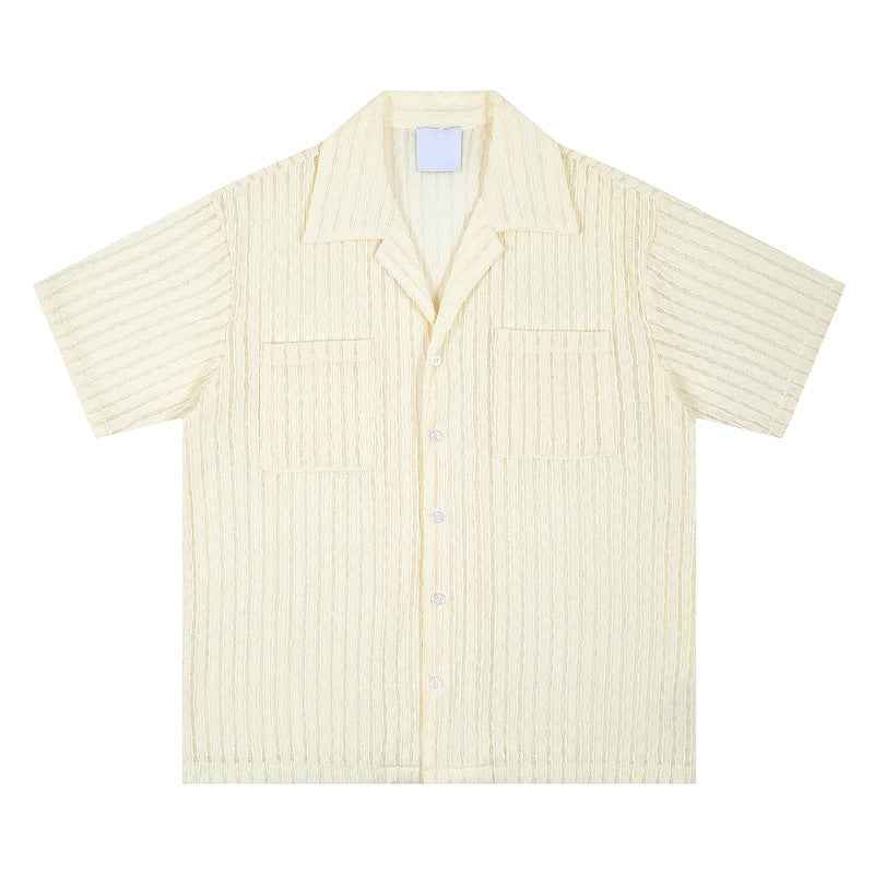 A loose and casual short-sleeved shirt with a design sense of wheat ear and milk apricot color, featuring a hollowed-out design